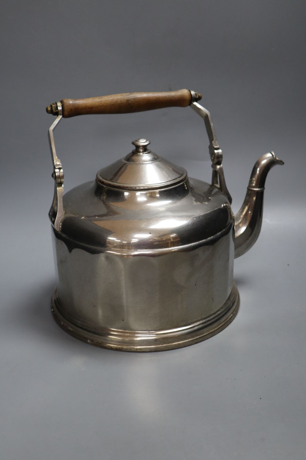 A large chrome kettle, with turned beech swing handle, height 28cm